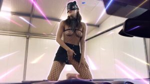 My striptease in a mask on a car at the wash