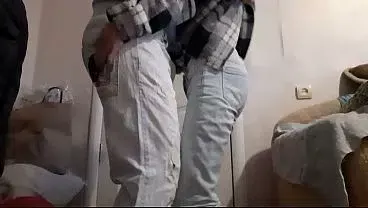 Married lesbian friends secretly have sex while their husbands watch football in the next room