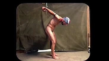 naked pathetic dirty white slave handcuffed, weights on gay balls, uncut penis and testicles swings like bells, CMNM