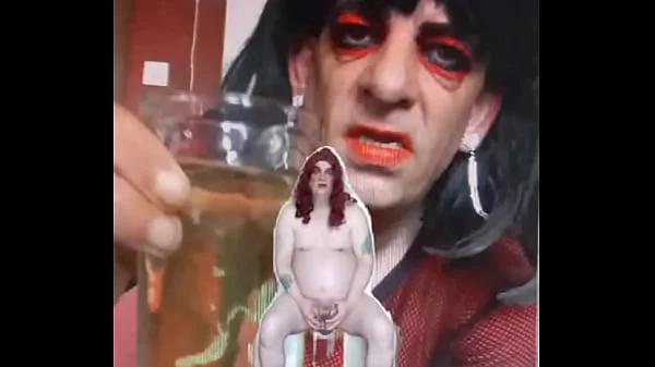 bisexual sissy male naked and exposed while taking a pee then swallowing it part 2